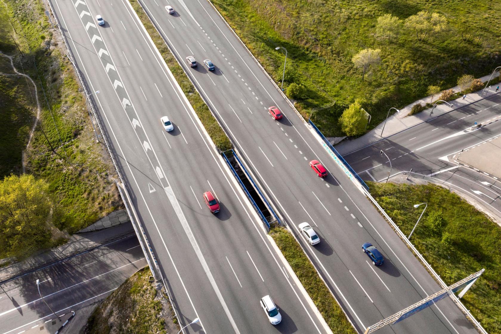 cars-driving-street-aerial-view.jpg