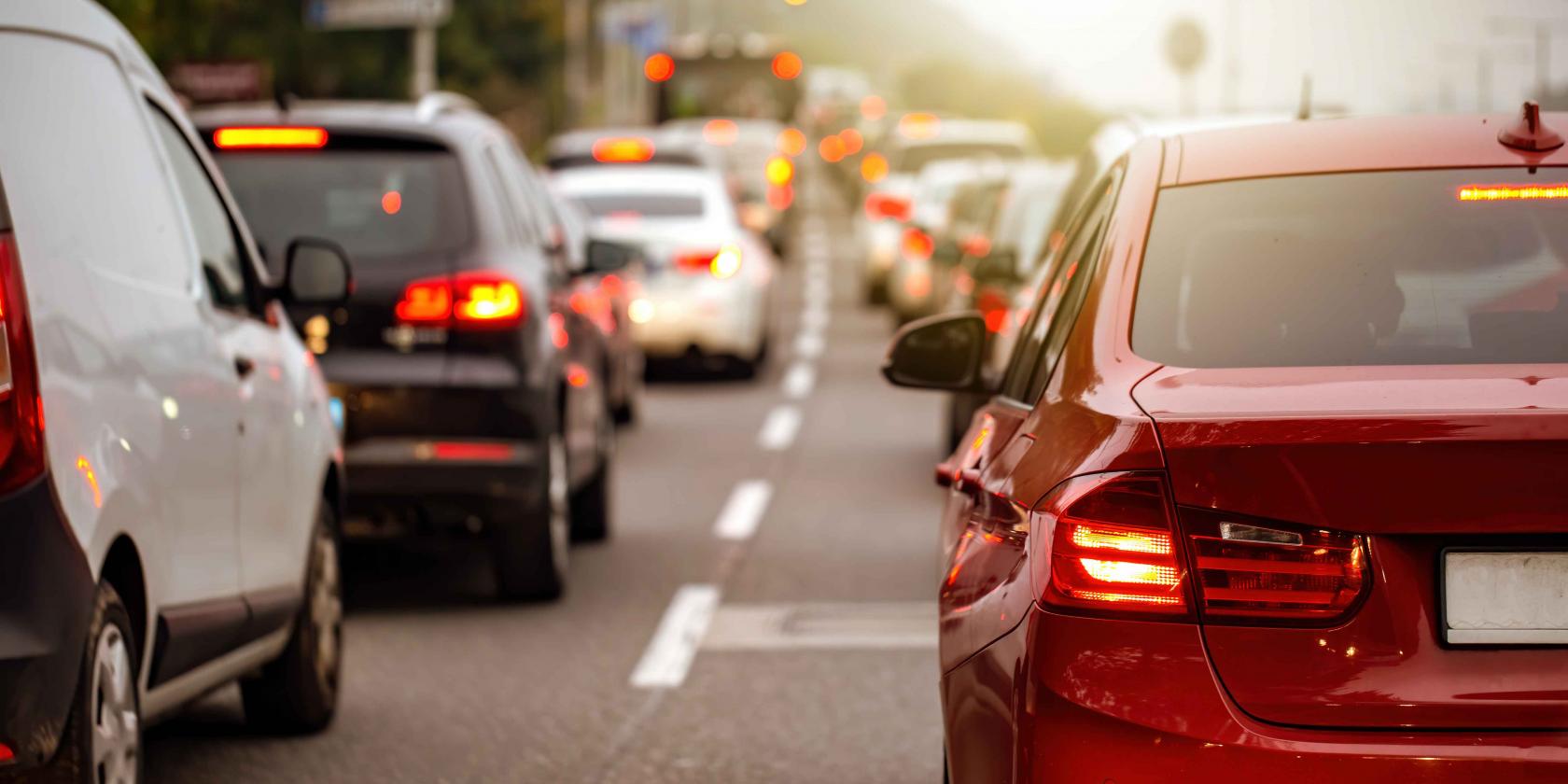 rear-view-modern-car-with-brake-lights-rush-hour.jpg
