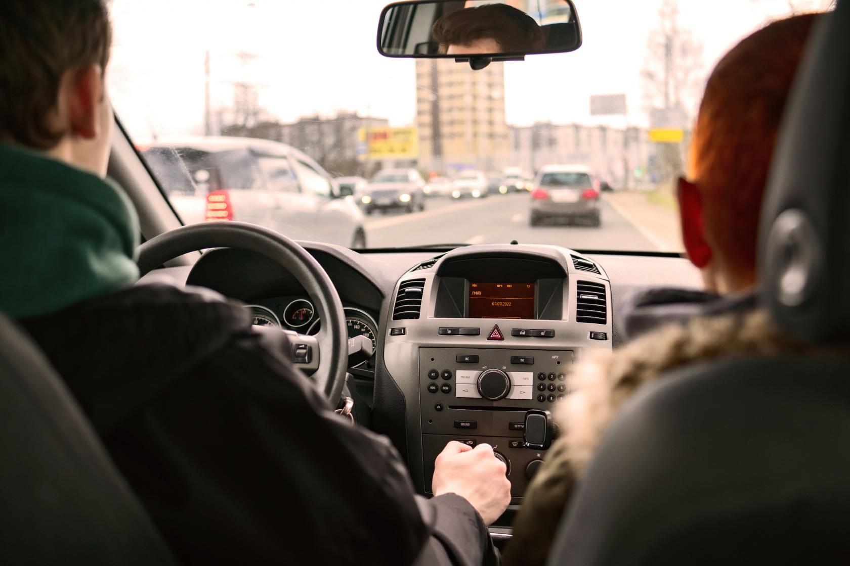rear-view-man-driving-car.jpg