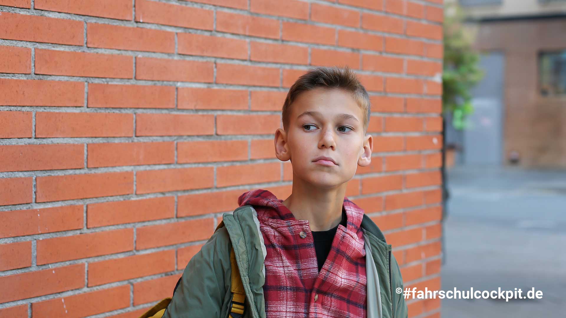 teenager-walking-through-city-outdoors.jpg