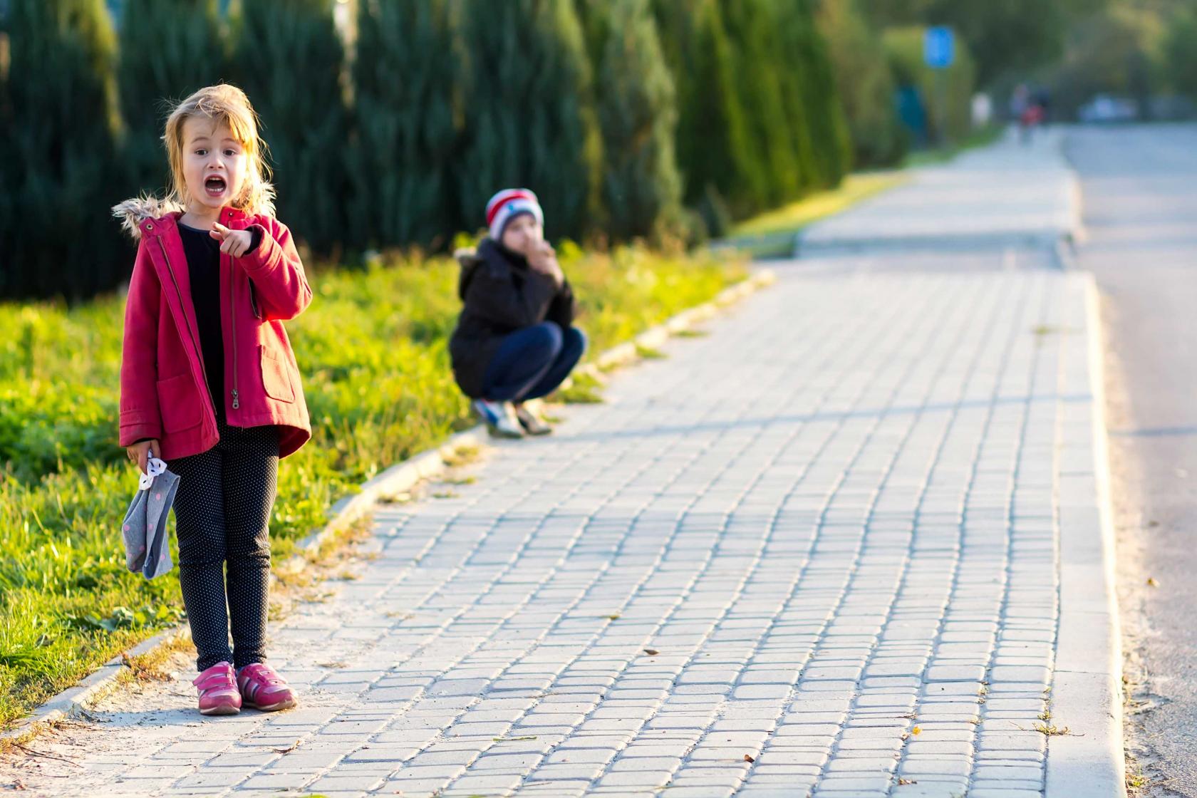 little-girl-boy-playing-outdoors-children-activity.jpg
